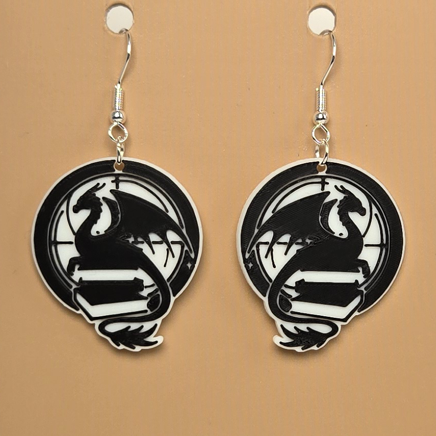 Boucle d'oreille en forme de Dragon Studio - Hypoallergénique